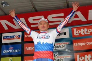 Serguei Ivanov (Team Katusha) celebrates his stage victory on the podium.