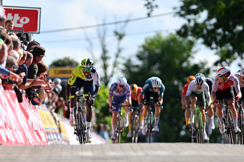 MONTDELENCLUS BELGIUM MAY 29 LR Biniam Girmay of Eritrea and Team IntermarcheWanty and Axel Zingle of France and Team Cofidis sprint at finish line to win the race during the 83rd Circuit FrancoBelge 2024 a 1906km one day race from Tournai to MontdelEnclus on May 29 2024 in MontdelEnclus Belgium Photo by Luc ClaessenGetty Images