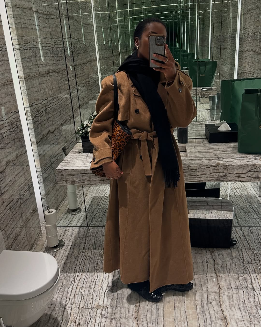 woman wearing statement coat outfit 2026