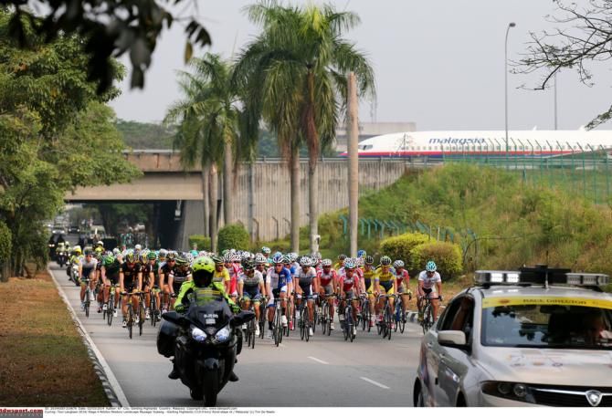 The peloton spread across the road