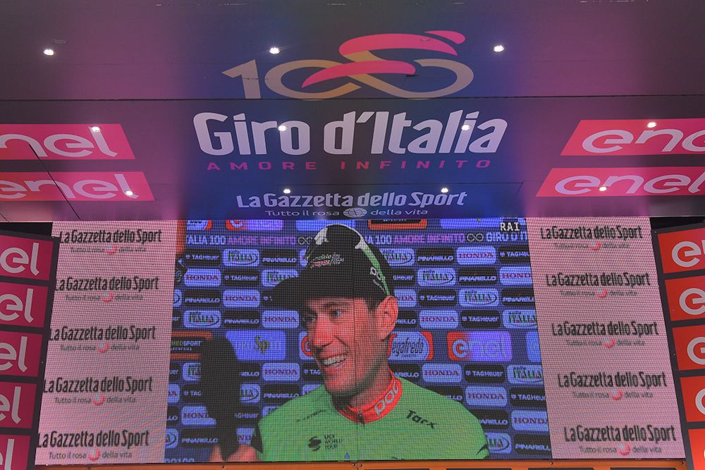 Pierre Rolland is broadcast on the big screen after winning stage 17 at the Giro d'Italia