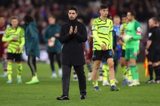 Mikel Arteta, Manager of Arsenal, applauds fans following their sides defeat in the Carabao Cup Fourth Round match between West Ham United and Arsenal at London Stadium on November 01, 2023 in London, England. (Photo by Alex Pantling/Getty Images)