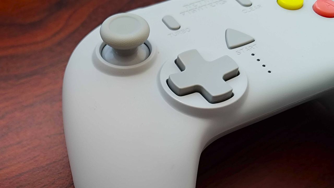 Close up of Retro Fighters StrikerDC controller d-pad and joystick.