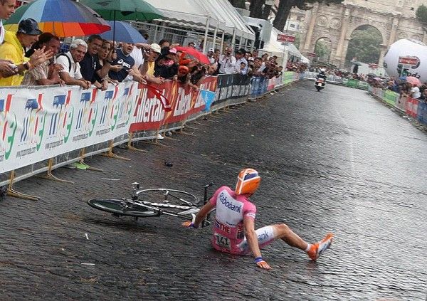 Disaster! Denis Menchov hits the deck inside of the final kilometre of the concluding time trial.