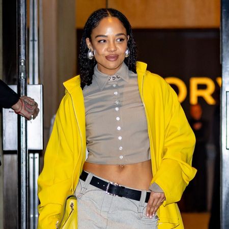 Tory Burch showgoer at New York Fashion Week styles the colour blocking trend.