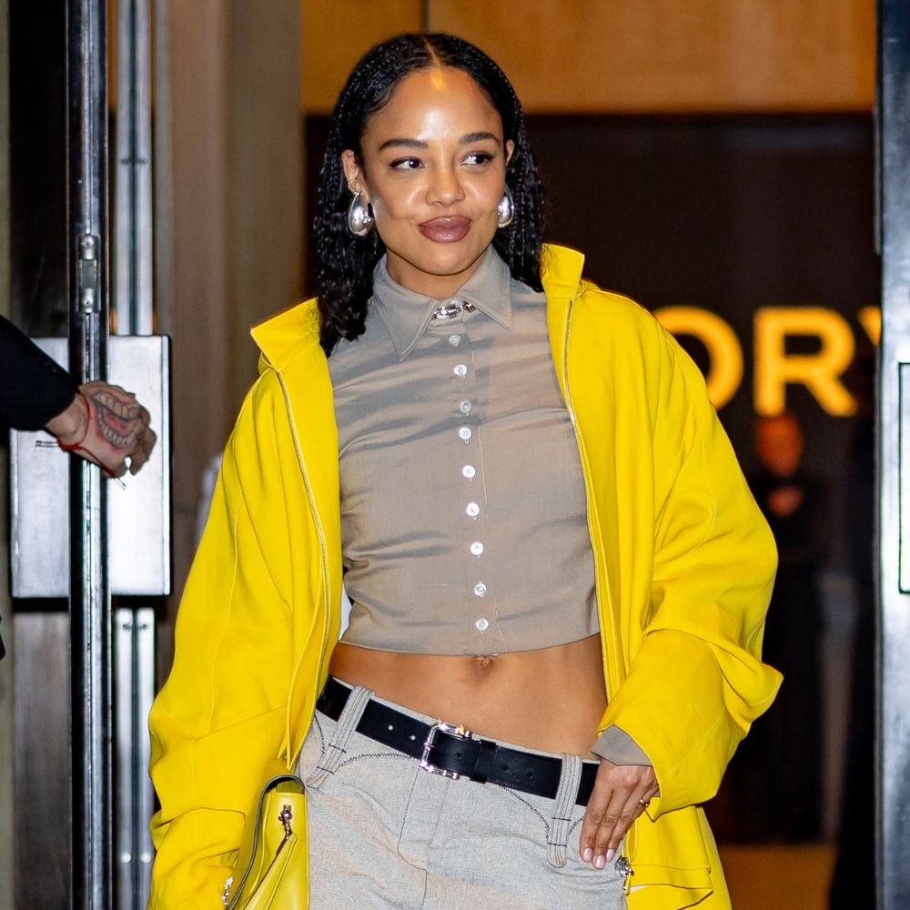 Tory Burch showgoer at New York Fashion Week styles the colour blocking trend.