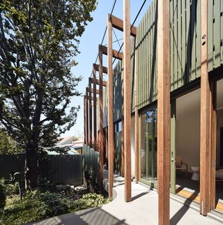 The new house is encircled by a walkway