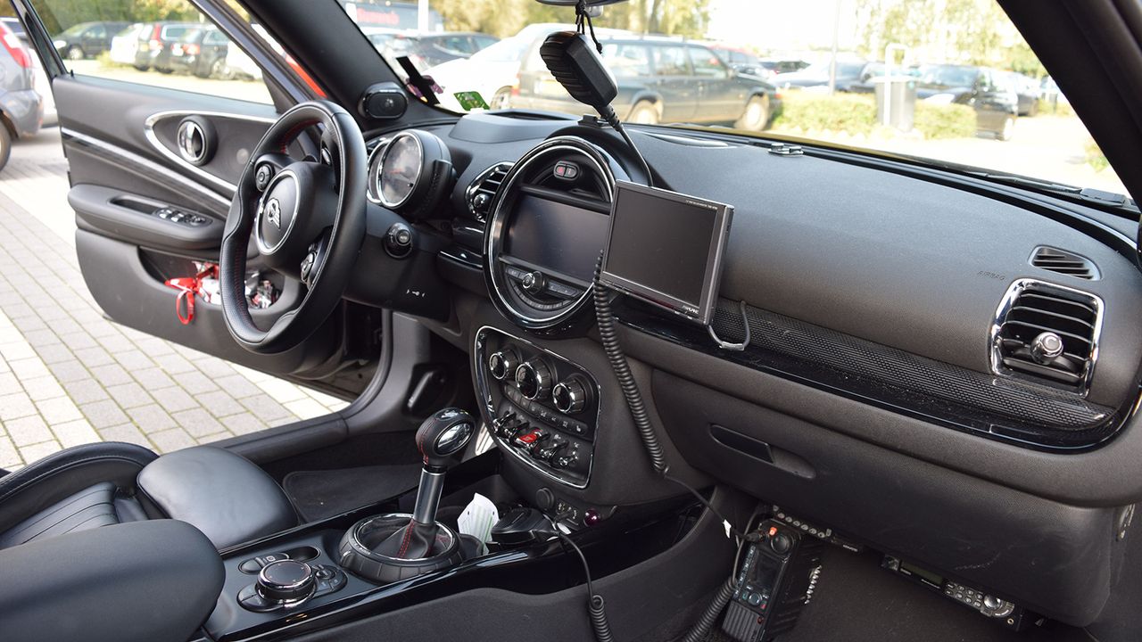 A monitor in the front and rear of the car enables video footage of the race