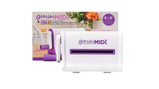 A product shot of the Gemini Midi embossing machine against a white background