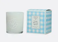 Orange Blossom Special Candle for $32, at Draper James