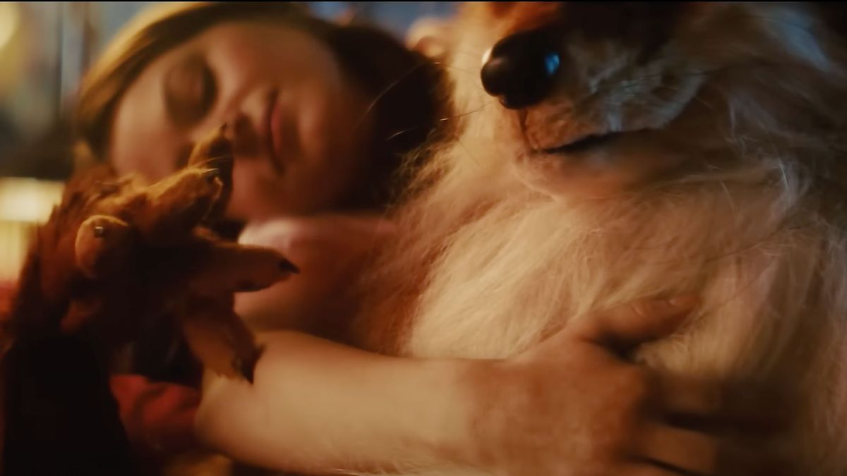 A shot of a humanoid fox stroking a human womans&#039; arm