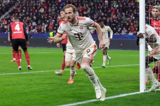 Harry Kane celebrates after scoring for Bayern Munich against Bayer Leverkusen in the Champions League in March 2025.