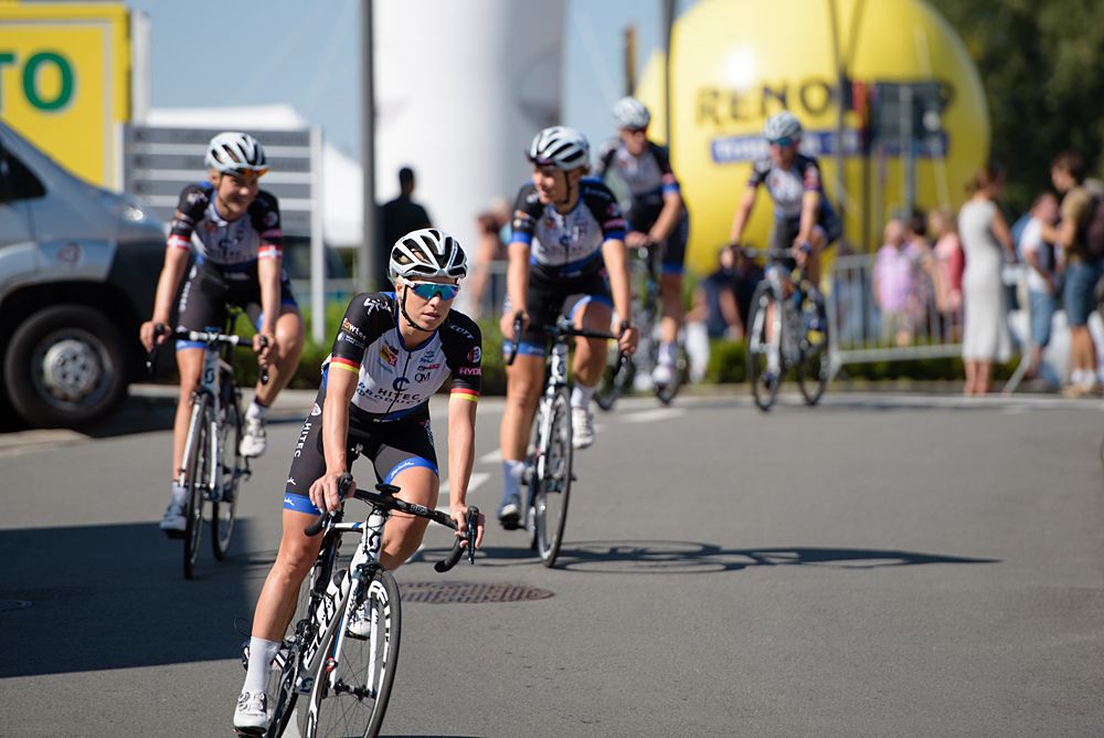 Charlotte Becker and her Hitec Products teammates make their way from sign in at the 108 km Stage 2 of the Lotto Belgium Tour 2016