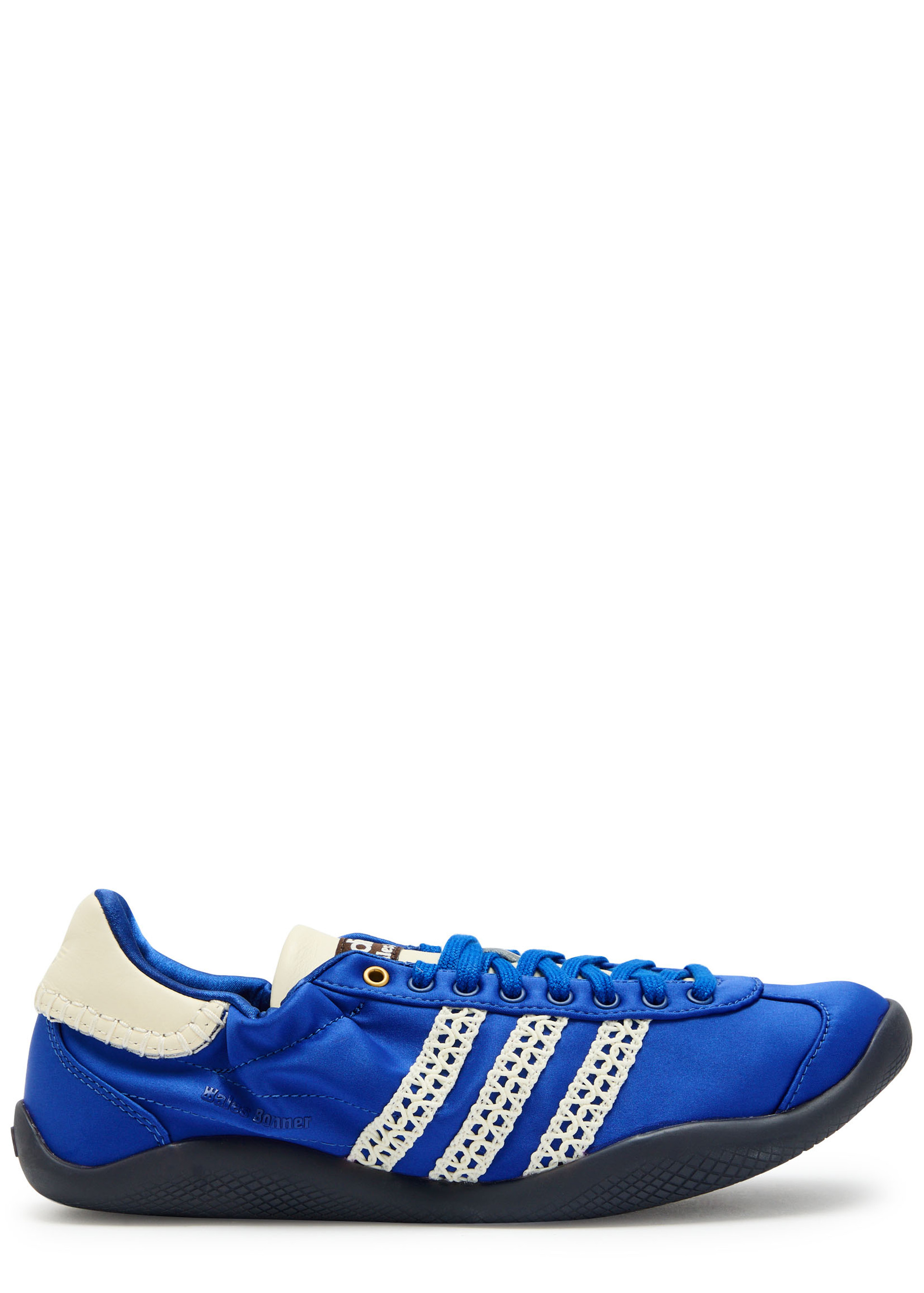 A pair of royal blue Adidas trainers