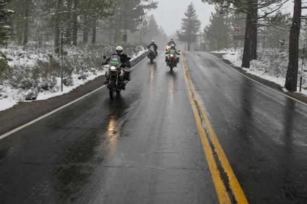 The race motos head out on the transfer from South Lake Tahoe to Northstar under not too bad of conditions