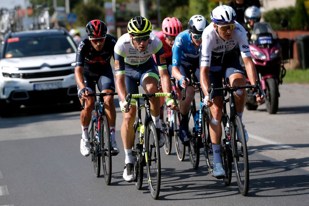 KRAKOW POLAND AUGUST 15 LR Pieter Vanspeybrouck of Belgium and Team Intermarch Wanty Gobert Matriaux and Alexis Renard of France and Team Israel StartUp Nation in the Breakaway during the 78th Tour de Pologne 2021 Stage 7 a 145km stage from Zabrze to Krakw TourdePologne TDP2021 UCIWT on August 15 2021 in Krakow Poland Photo by Bas CzerwinskiGetty Images