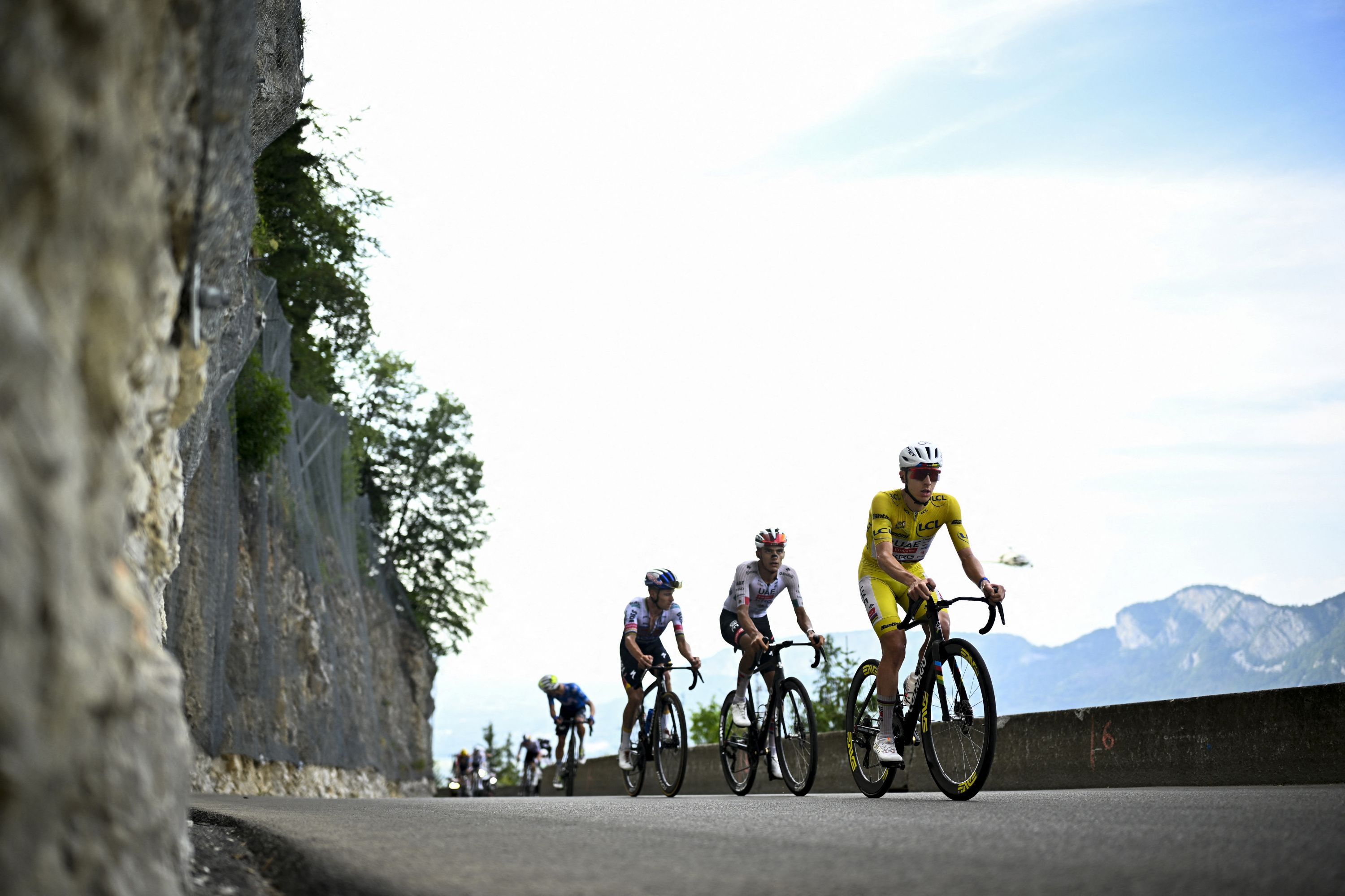 Slovenian Tadej Pogacar of UAE Team Emirates XRG followed by Mexican Isaac Del Toro of UAE Team Emirates XRG and Belgian Remco Evenepoel of Red Bull-BORA-hansgrohe pictured during stage 15 of the 2026 Tour de France cycling race, a stage of 184km from Champagnole to Plateau de Solaison, on Sunday 19 July 2026. The 113th edition of the Tour de France starts on Saturday 4 July in Barcelona, Spain, and will finish in Paris, France on the 26th of July. BELGA PHOTO JASPER JACOBS (Photo by JASPER JACOBS / BELGA MAG / Belga / AFP via Getty Images)