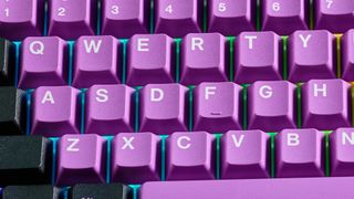 A black and purple Epomaker EK68 wireless mechanical keyboard