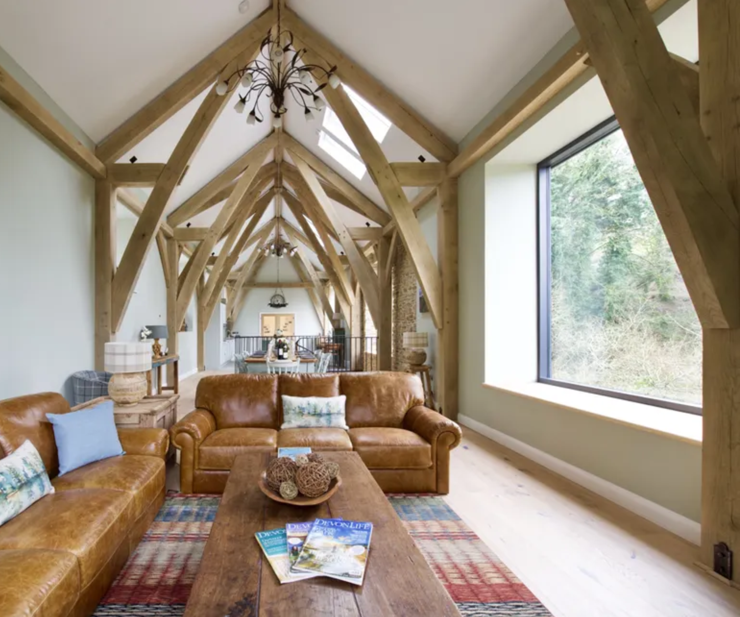 Barn conversion with large window letting in natural light