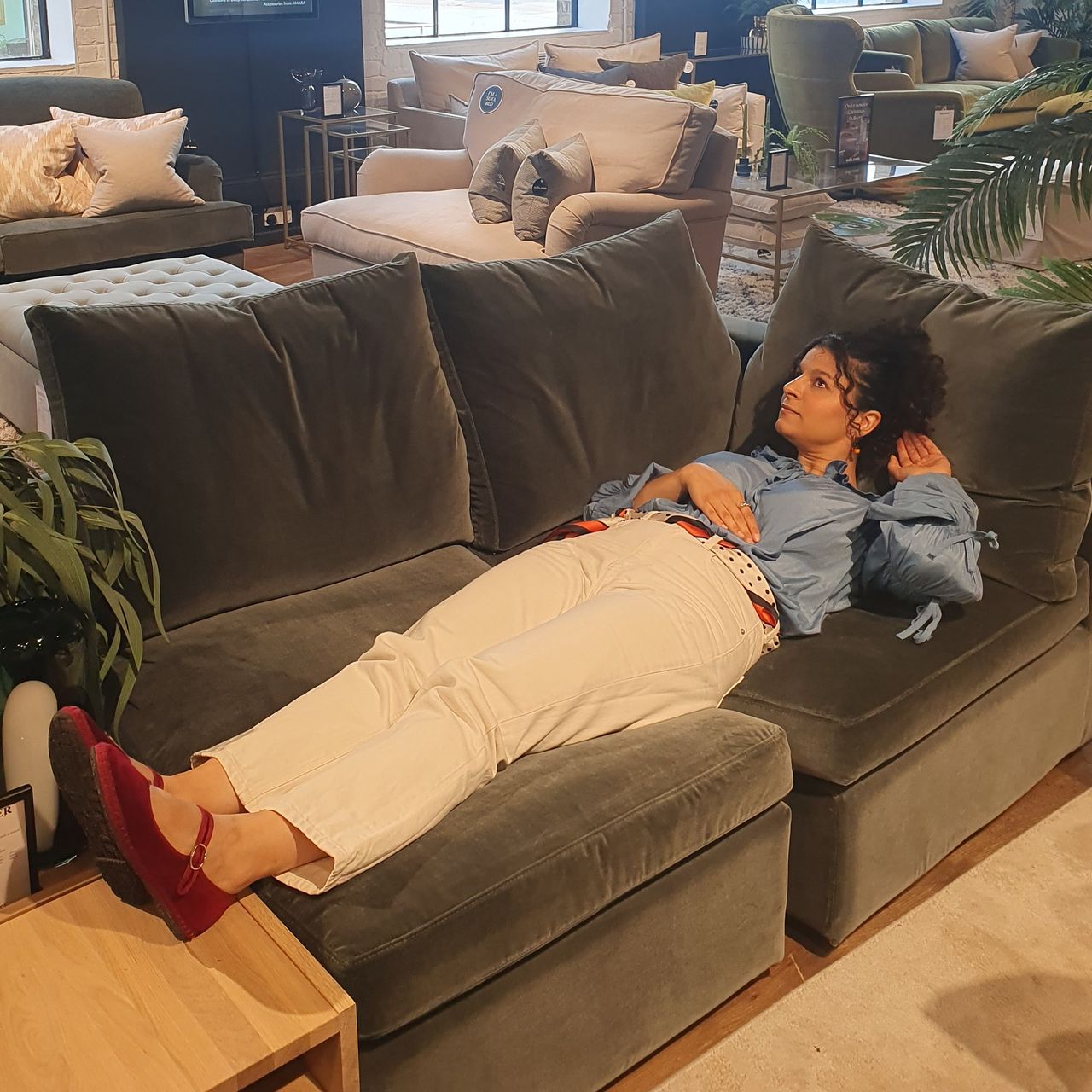 Ideal Home's Content Editor, Sara Hesikova testing a modular sofa