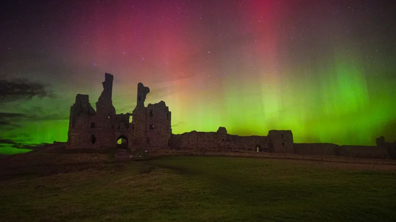 Photograph of mysterious STEVE above Dunstanburgh Castle Northumberland, UK.