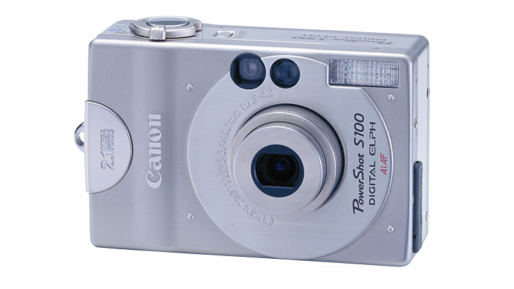 Canon compact camera against a white background