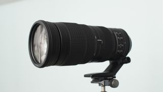 Image shows the Nikkor AF-S 200-500mm f/5.6E ED VR lens against a white background.