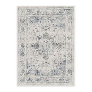 A blue and white printed rug