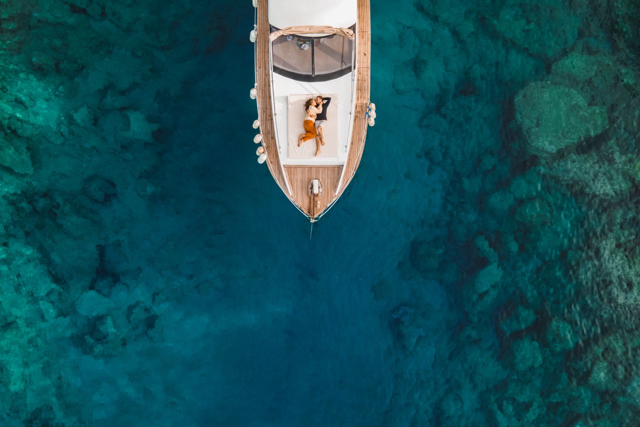 A yacht with a couple at the bow