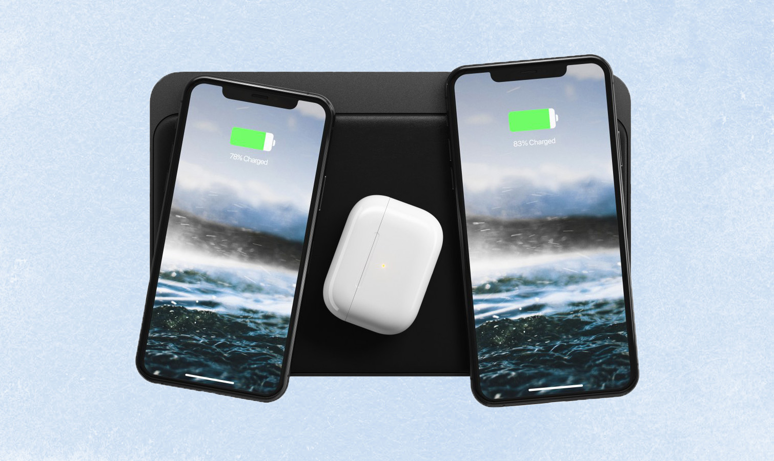 Nomad Base Station Pro with two iPhones and AirPods Pro