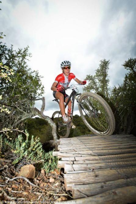 Team RE:CM's Annika Langvad negotiates a wooden bridge during the prologue of the Cape Pioneer Trek on Sunday. Langvad and teammate Ariane Kleinhans won the stage in the women's category.