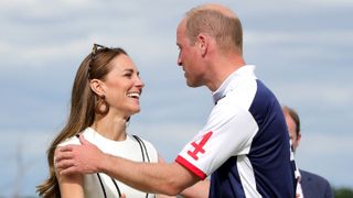 Prince William, Duke of Cambridge and Catherine, Duchess of Cambridge embrace after the Royal Charity Polo Cup 2022 at Guards Polo Club during the Outsourcing Inc. Royal Polo Cup at Guards Polo Club,