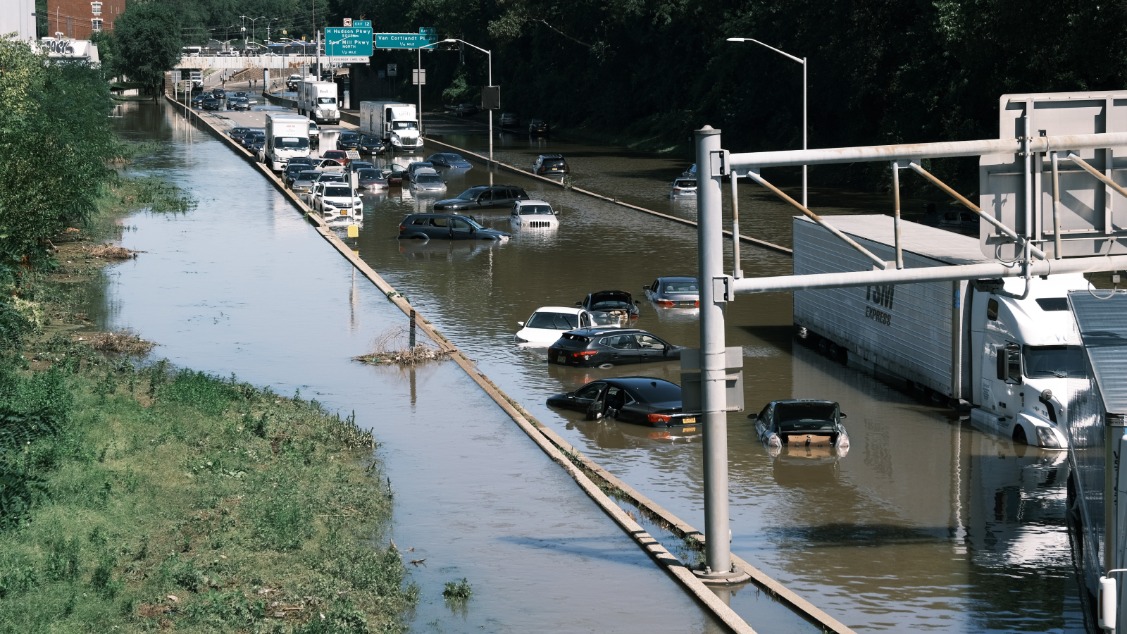 Cars sit abandoned on the flooded Major Deegan Expressway in the Bronx following a night of heavy wind and rain from the remnants of Hurricane Ida on September 02, 2021 in New York City. 