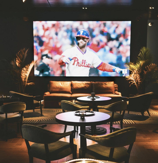 The 13,000-square-foot and 350+ seat Bankroll in Philly is a plush sports bar offering high-quality video and sound.