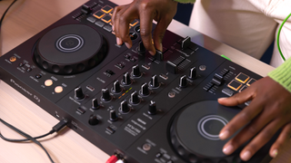 Hands on a pioneer DJ controller