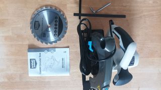 MacAllister 1500W circular saw and accessories on table