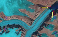 As the Coronation Glacier retreats (red arrows indicate its terminus in 1989), a little island has emerged (at the yellow arrows).