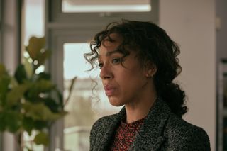 Jen Rafferty (Pearl Mackie) shot in close-up, looking off to the left with a concerned expression on her face