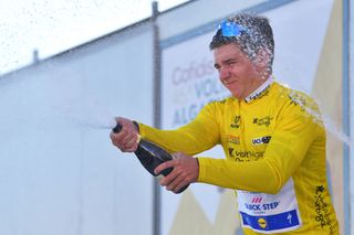 LAGOA PORTUGAL FEBRUARY 23 Podium Remco Evenepoel of Belgium and Team Deceuninck Quick Step Yellow Leader Jersey Celebration Champagne during the 46th Volta ao Algarve 2020 Stage 5 a 203km Individual Time Trial stage from Lagoa to Lagoa ITT VAlgarve2020 on February 23 2020 in Lagoa Portugal Photo by Tim de WaeleGetty Images