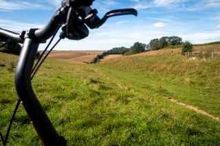 Brompton handlebars pointing towards fields