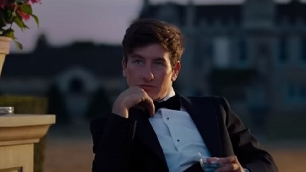 Barry Keoghan looking dapper in a suit and bow tie in Saltburn