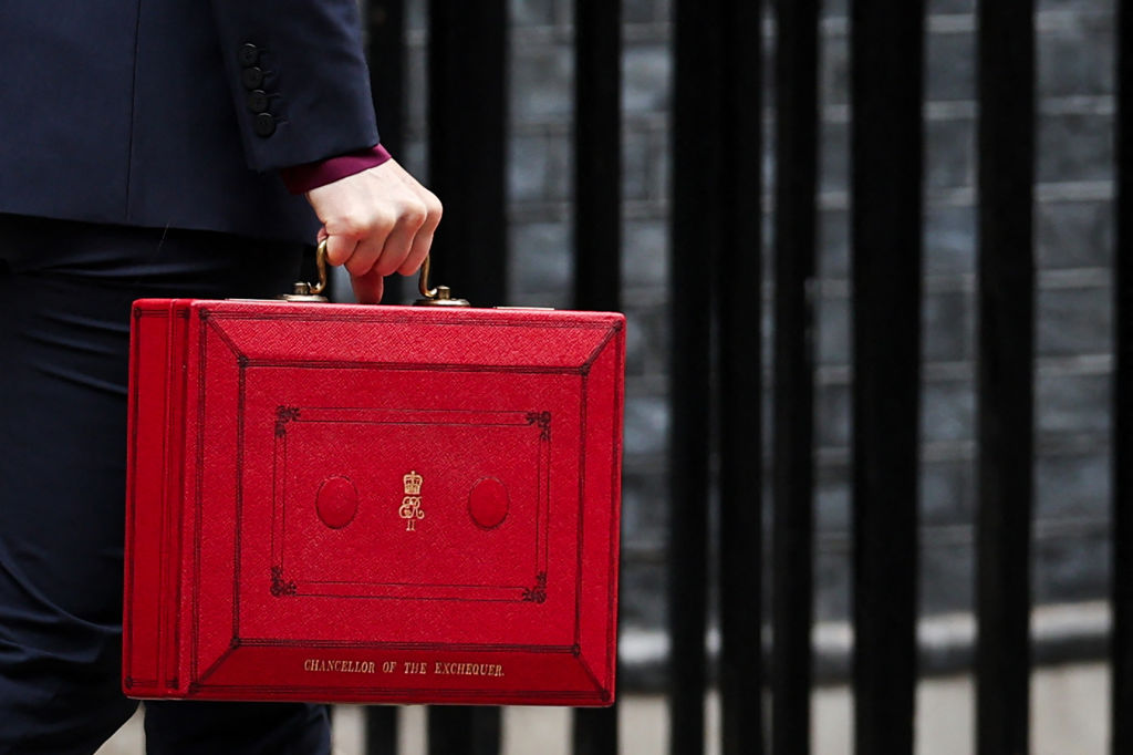 Chancellor of the Exchequer Rachel Reeves carries the little red box