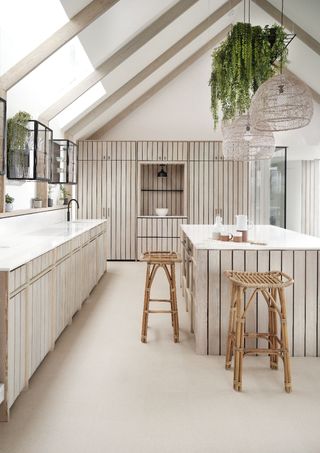 neutral kitchen scheme with cork flooring and vaulted ceiling