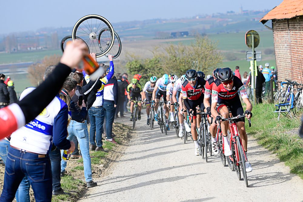 Mechanics with wheels wait for riders