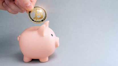 Concept art of someone placing a Bitcoin inside of a piggy bank