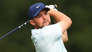 Alex Fitzpatrick takes a tee shot at the Betfred British Masters