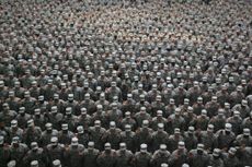 U.S. soldiers take an oath during a mass reenlistment ceremony in Baghdad in 2008.