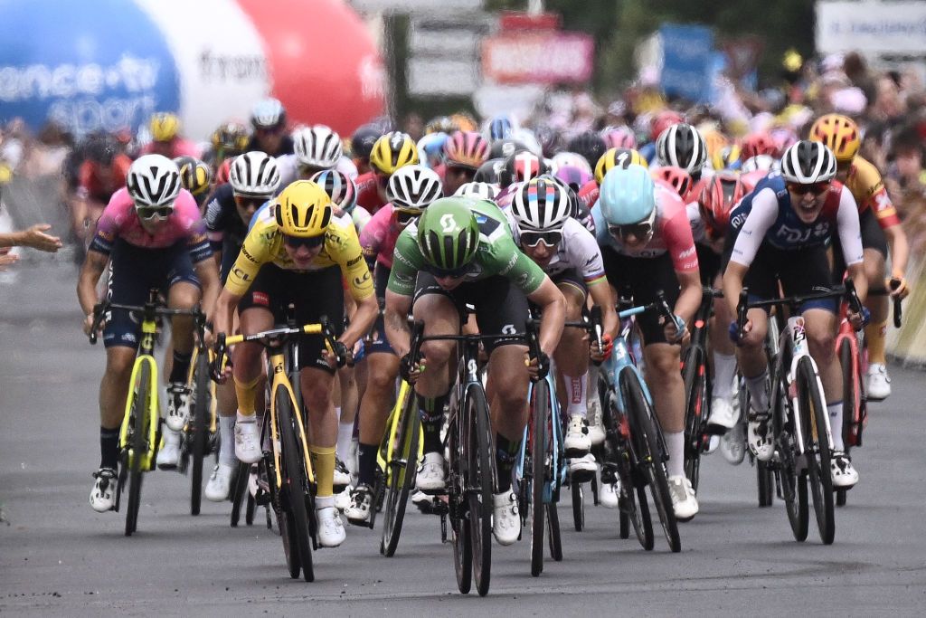 Team DSMs Dutch rider Lorena Wiebes C followed by Team Jumbo Vismas Dutch rider Marianne Vos L cycles to the finish line to win the 5th stage of the new edition of the Womens Tour de France cycling race 1756 km between BarleDuc and SaintDiedesVosges eastern France on July 28 2022 Photo by Jeff PACHOUD AFP Photo by JEFF PACHOUDAFP via Getty Images