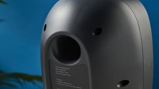 the majority d80 speakers, a pair of black egg-shaped speakers with mesh casing, HDMI, bluetooth, aux connectivity