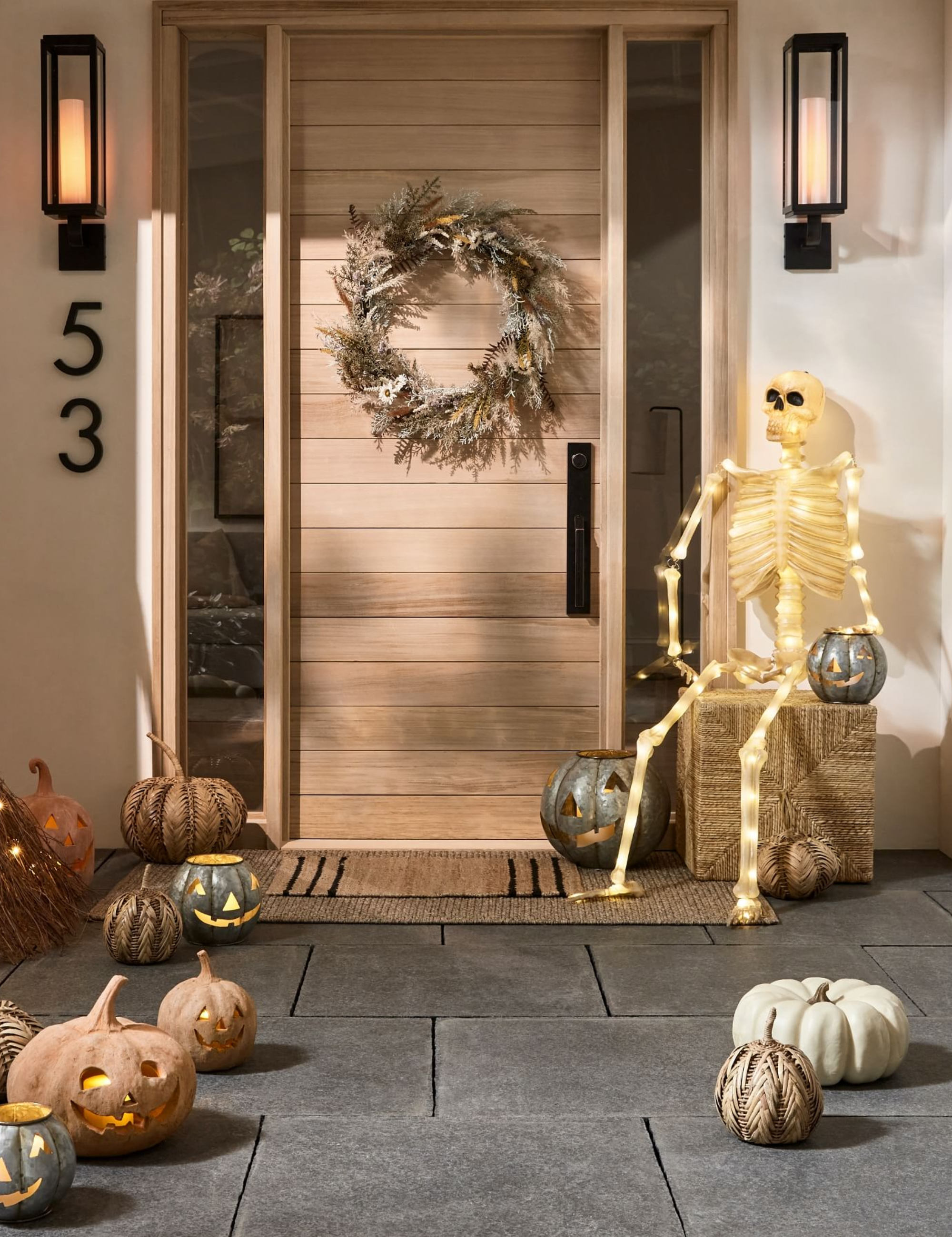 modern home front porch for pumpkin lantern decor and a light up skeleton